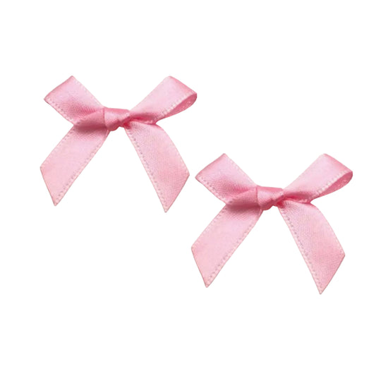 Pink mini bows for cake decorating.