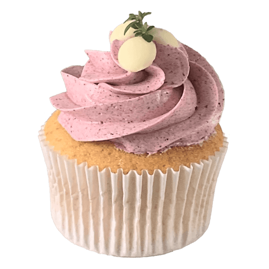 A vanilla sponge cupcake topped with freeze dried Boysenberry in a Swiss meringue buttercream. Garnished with Belgian white chocolate drops.