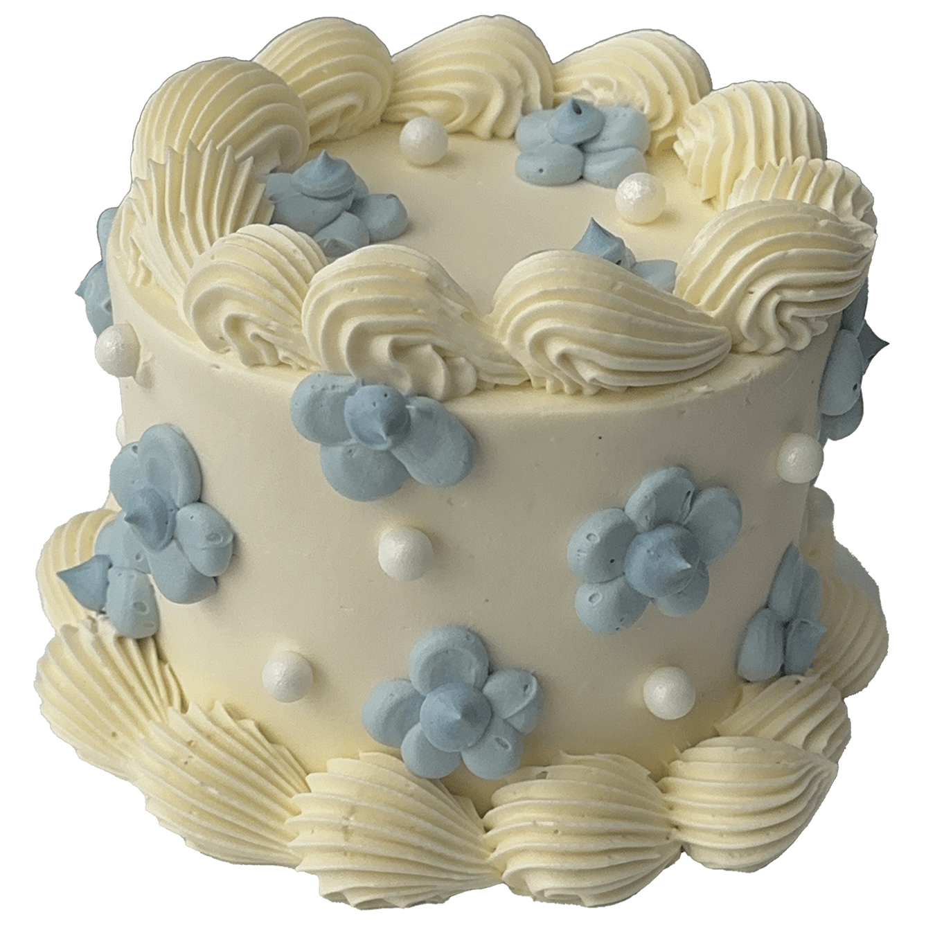  A small mini round shaped Swiss meringue buttercream cake with a white base colour and white piped shells.  Pretty blue daisies have been piped on the top and sides of the cake and some sugar pearls added to complete the decoration.