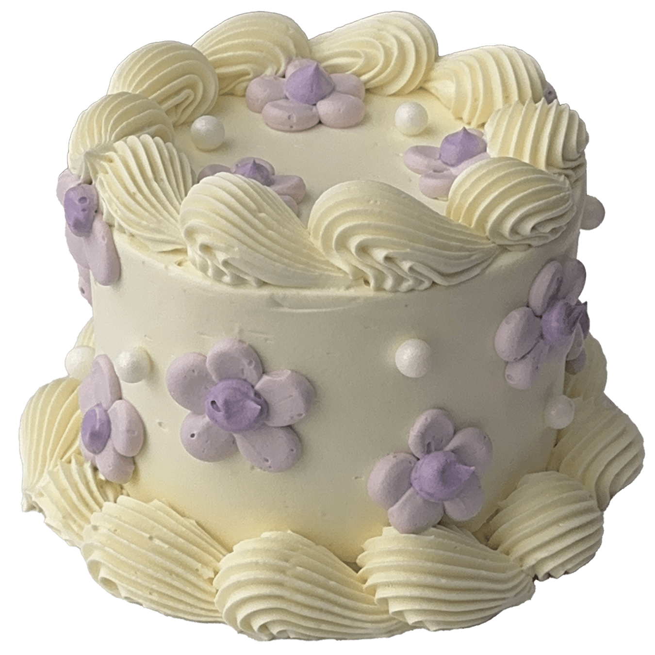  A small mini round shaped Swiss meringue buttercream cake with a white base colour and white piped shells.  Pretty purple daisies have been piped on the top and sides of the cake and some sugar pearls added to complete the decoration.