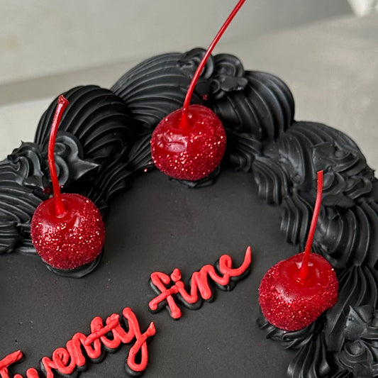 Red Cherries coated in edible glitter to add as a decoration to your cake